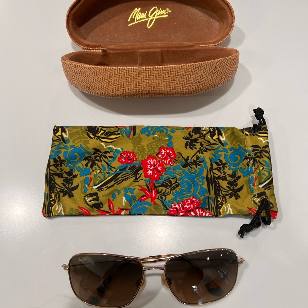 Brown lenses with gold frame and tortoise earpiece - perfect condition